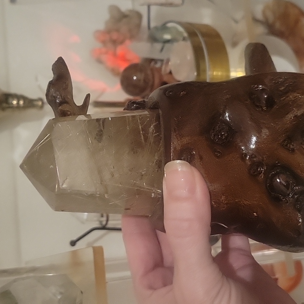 Large quartz with golden rutile with stand